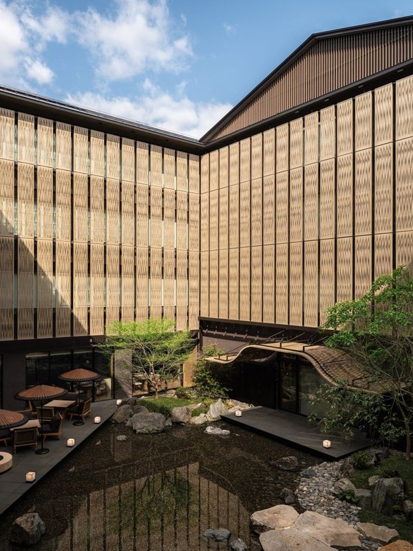 Traditional wooden townhouses inform interiors of Kengo Kuma-designed Capella Kyoto hotel