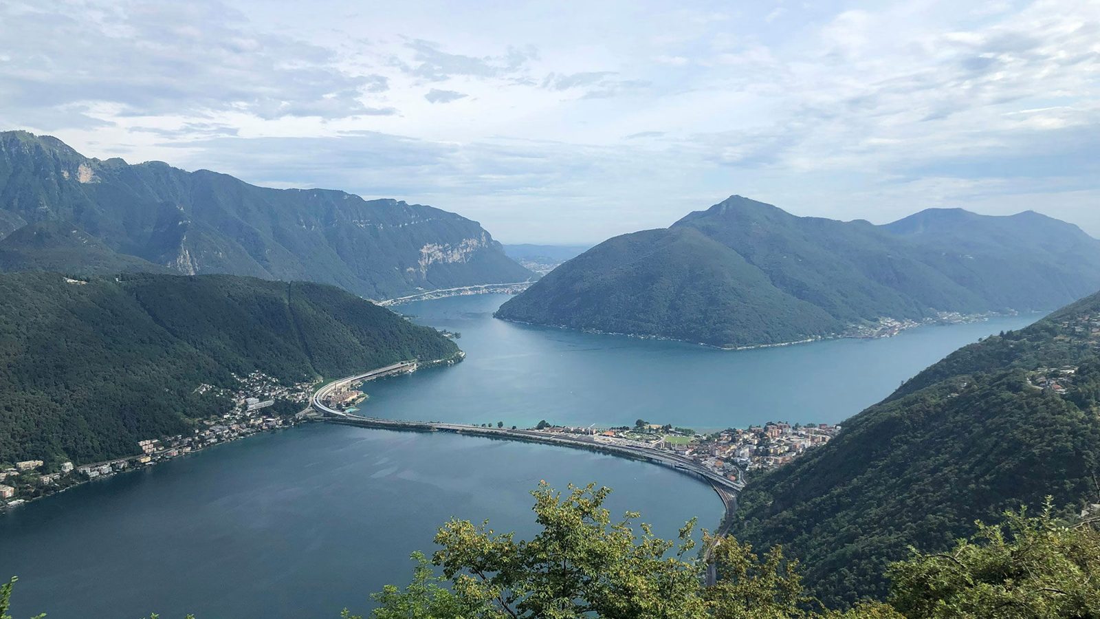 Lake Lugano and the mountains of Ticino, the setting of the Swiss Diamond Hotel