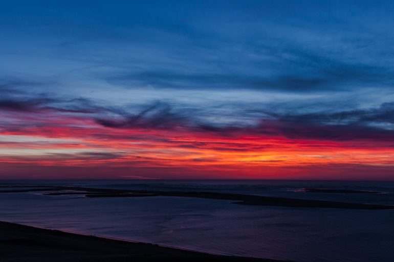 Coucher de soleil sur la dune du Pilat et le bassin d'Arcachon