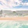 Modern beachfront hotel complex with two curved glass buildings, pool, and sandy shore.