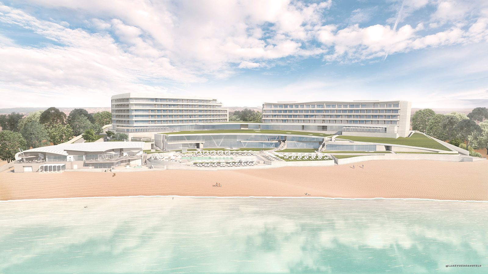 Modern beachfront hotel complex with two curved glass buildings, pool, and sandy shore.