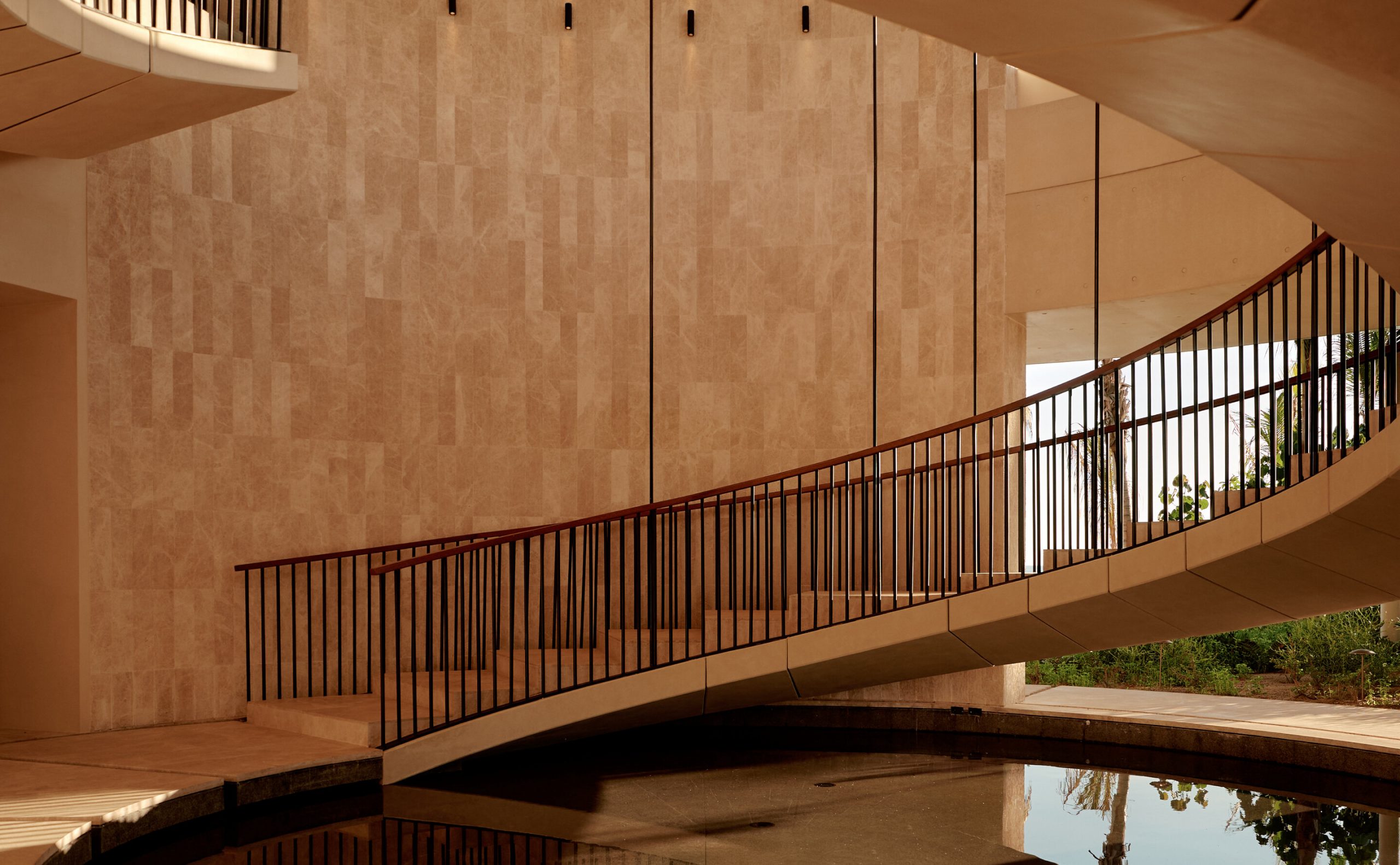The staircase at Amanvari, in hand-applied white concrete