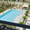 The outdoor pool and garden courtyard of the Carlton Cannes hotel on the Croisette, French Riviera