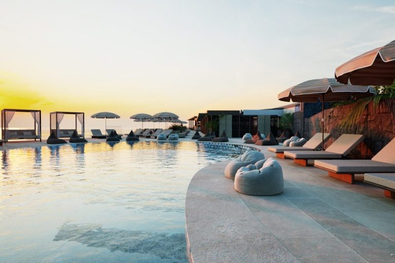 La piscine de l'Ella Elyra face au coucher de soleil sur la mer Ionienne, à Corfou