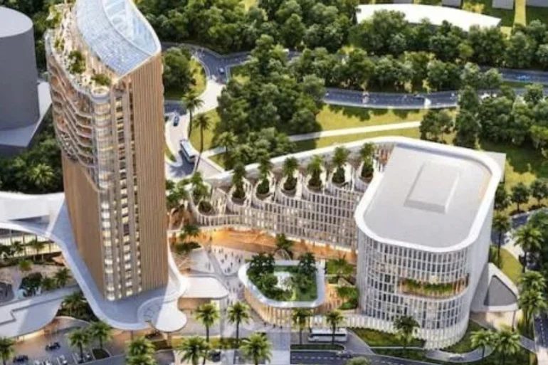 Rendu du Kempinski Shekinah Palace à Douala : une tour hôtelière et un socle de bureaux et de commerces au milieu des jardins de Bonanjo