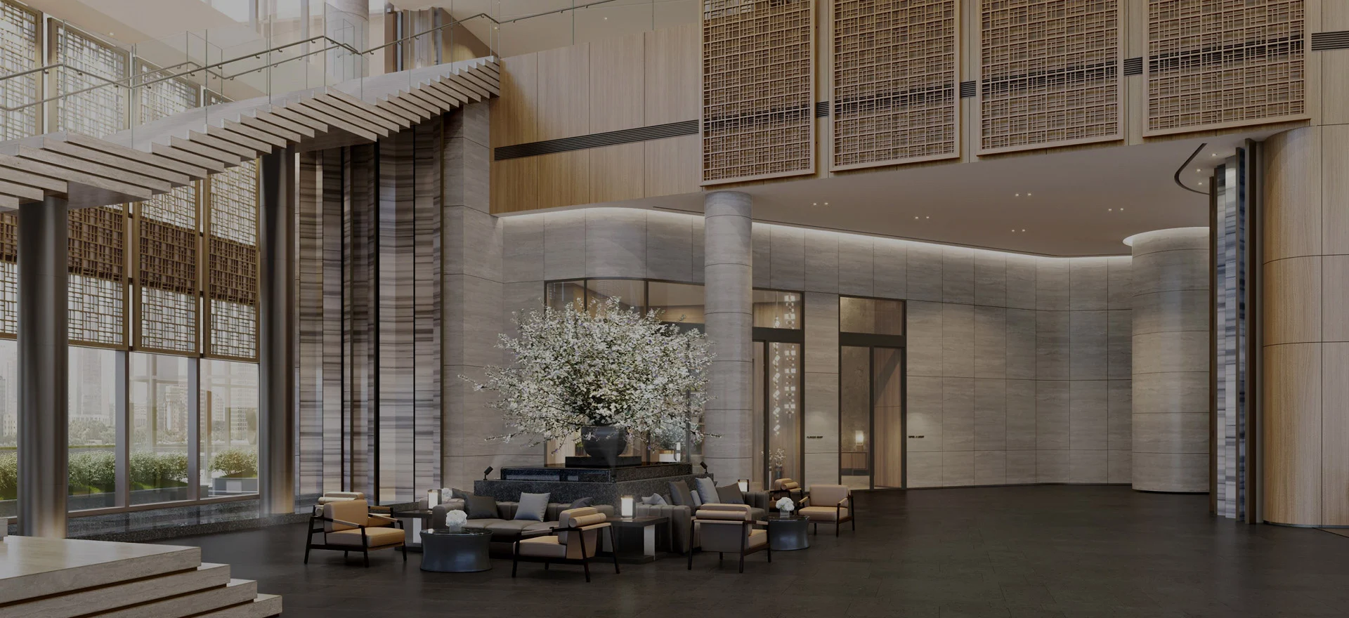 Lobby à double hauteur du Shilla Monogram Hanoi West Lake, claustras de bois ajouré, colonnes de pierre et salon devant les baies vitrées