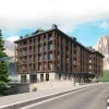 Rendu de la façade en mélèze et pierre de l'hôtel The First Cortina, face aux Dolomites, à Cortina d'Ampezzo
