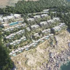 Rendu aérien du futur Four Seasons Resort Tanger au cap Malabata, villas en terrasses au-dessus du détroit de Gibraltar