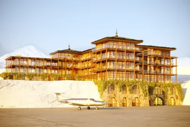 Rendu de l'hôtel Lily of the Valley Courchevel, façades en bois et terrasses au bord de la piste de l'altiport, un avion stationné devant