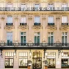 Façade haussmannienne du Sofitel Le Scribe Paris Opéra et son enseigne Hôtel Scribe, rue Scribe